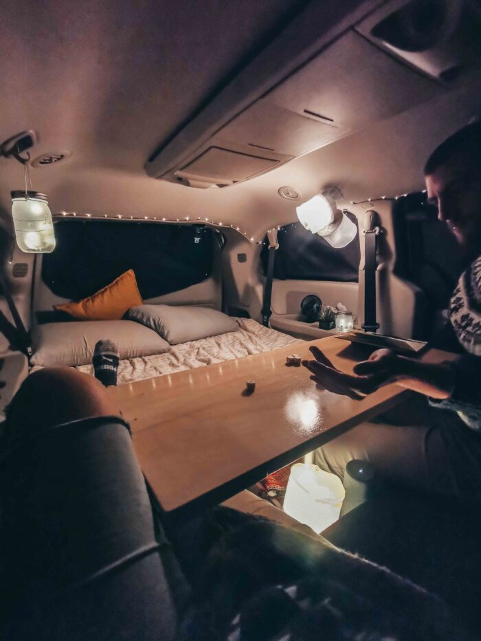 Table inside minivan camper conversion kit