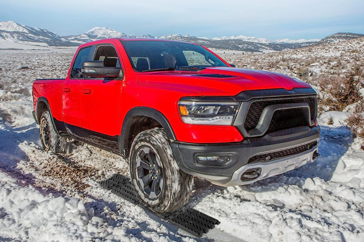 Niveleur et aide-traction