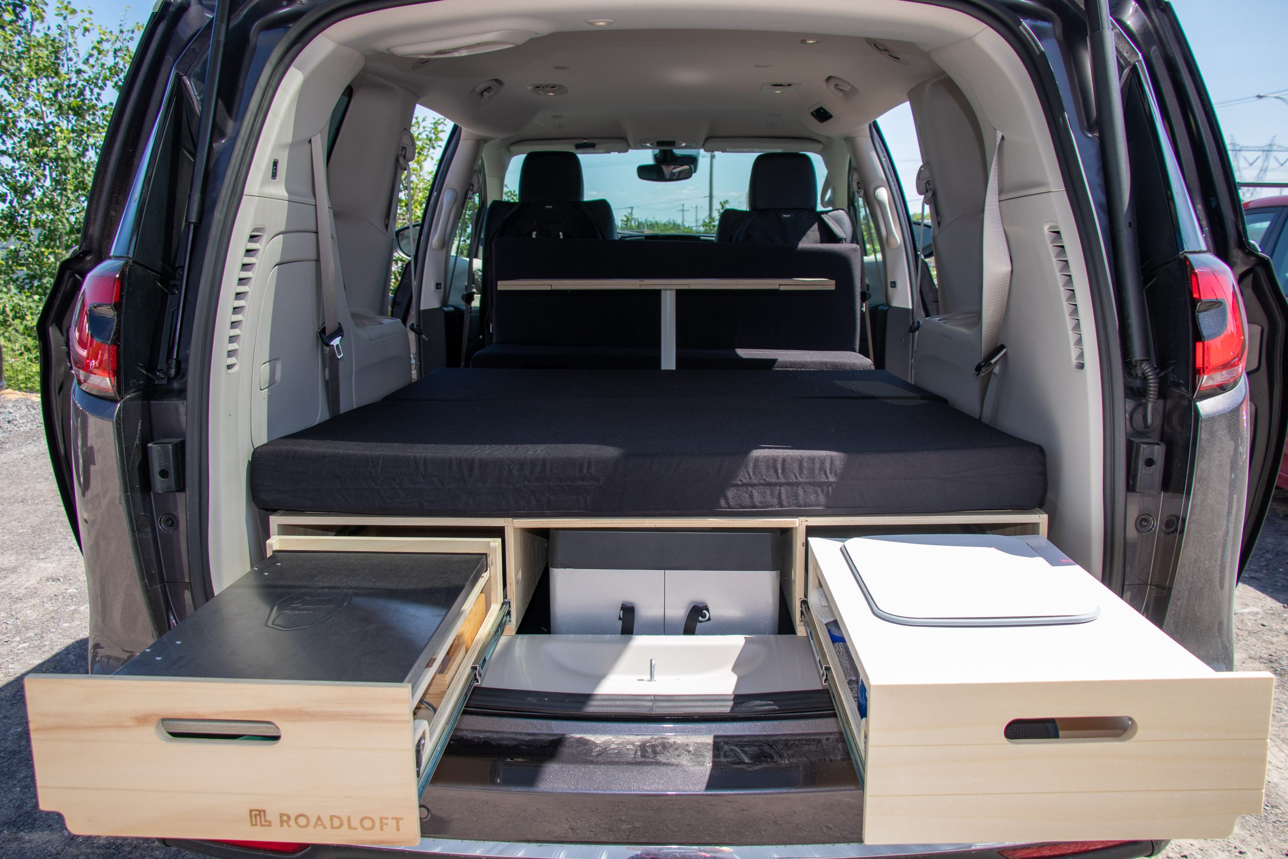 Removable conversion kit for minivan Roadloft