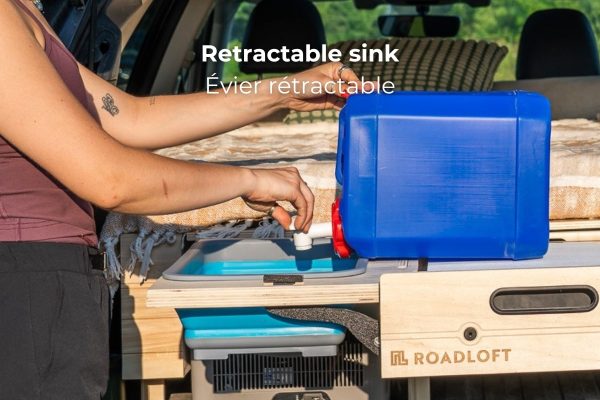 Retractable sink in Roadloft's hatchback car camper conversion kit