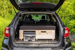 Solo bed of the Hatchback car camper conversion by Roadloft