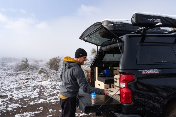 Pickup truck camping setup in winter