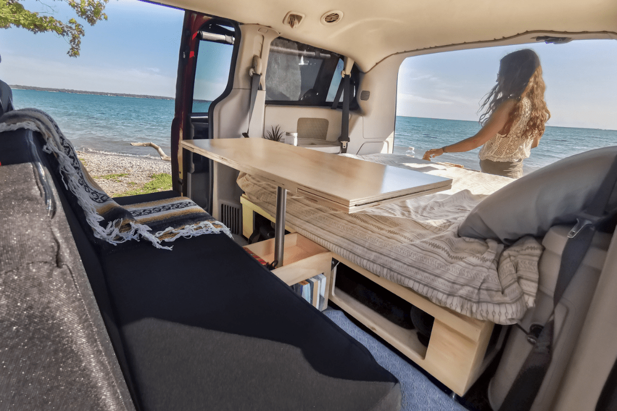 Turn your minivan into a camper with the Roadloft all-in-one conversion kit.