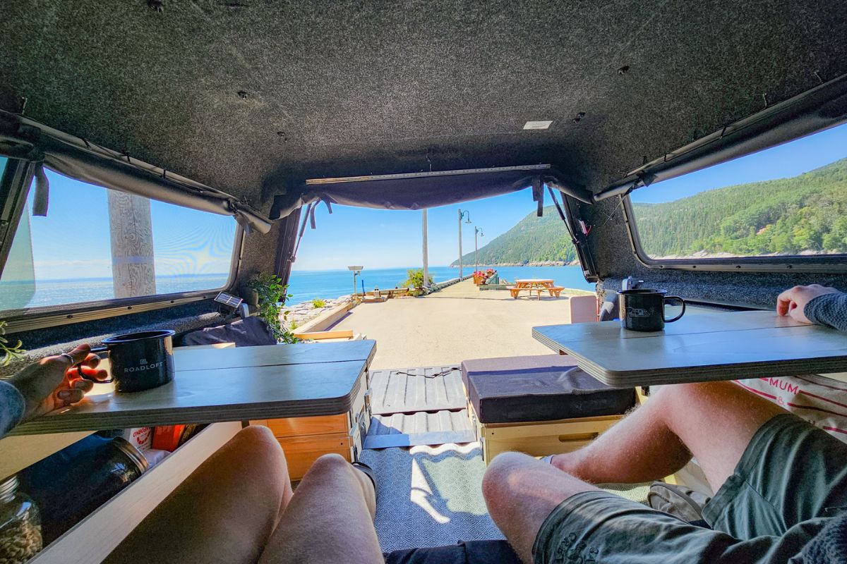 Enjoy breathtaking views from the comfort of your Roadloft camper table setup.