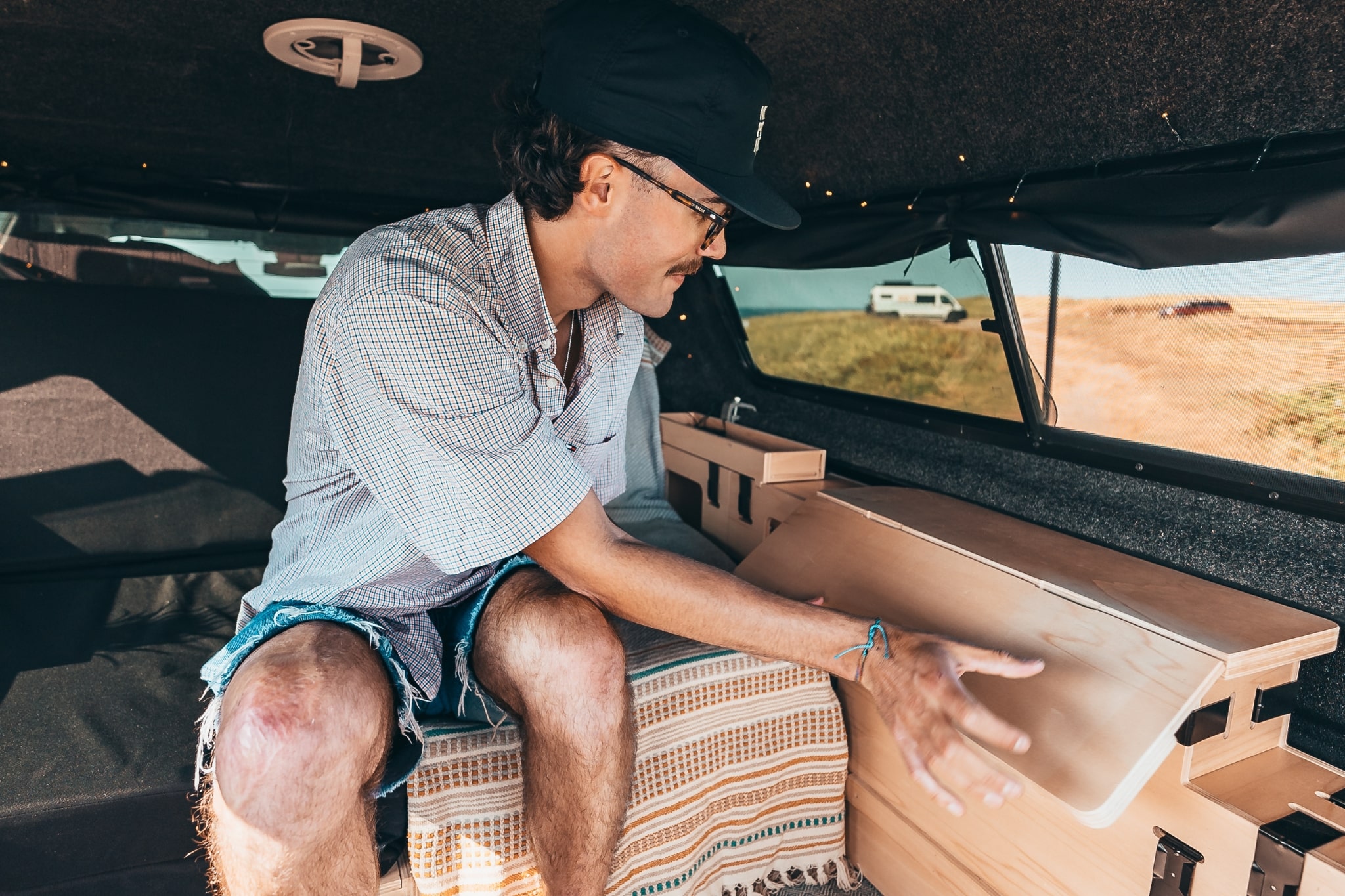 Adjustable and multi-purpose camper table