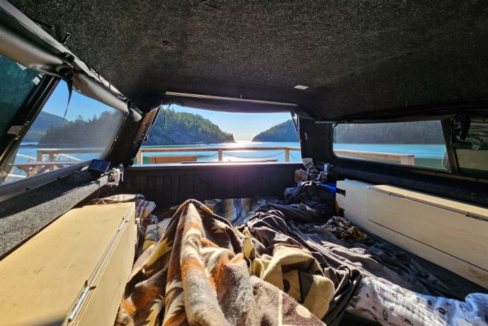 Spacious 71-inch sleeping area in the Roadloft camper conversion for maximum relaxation.