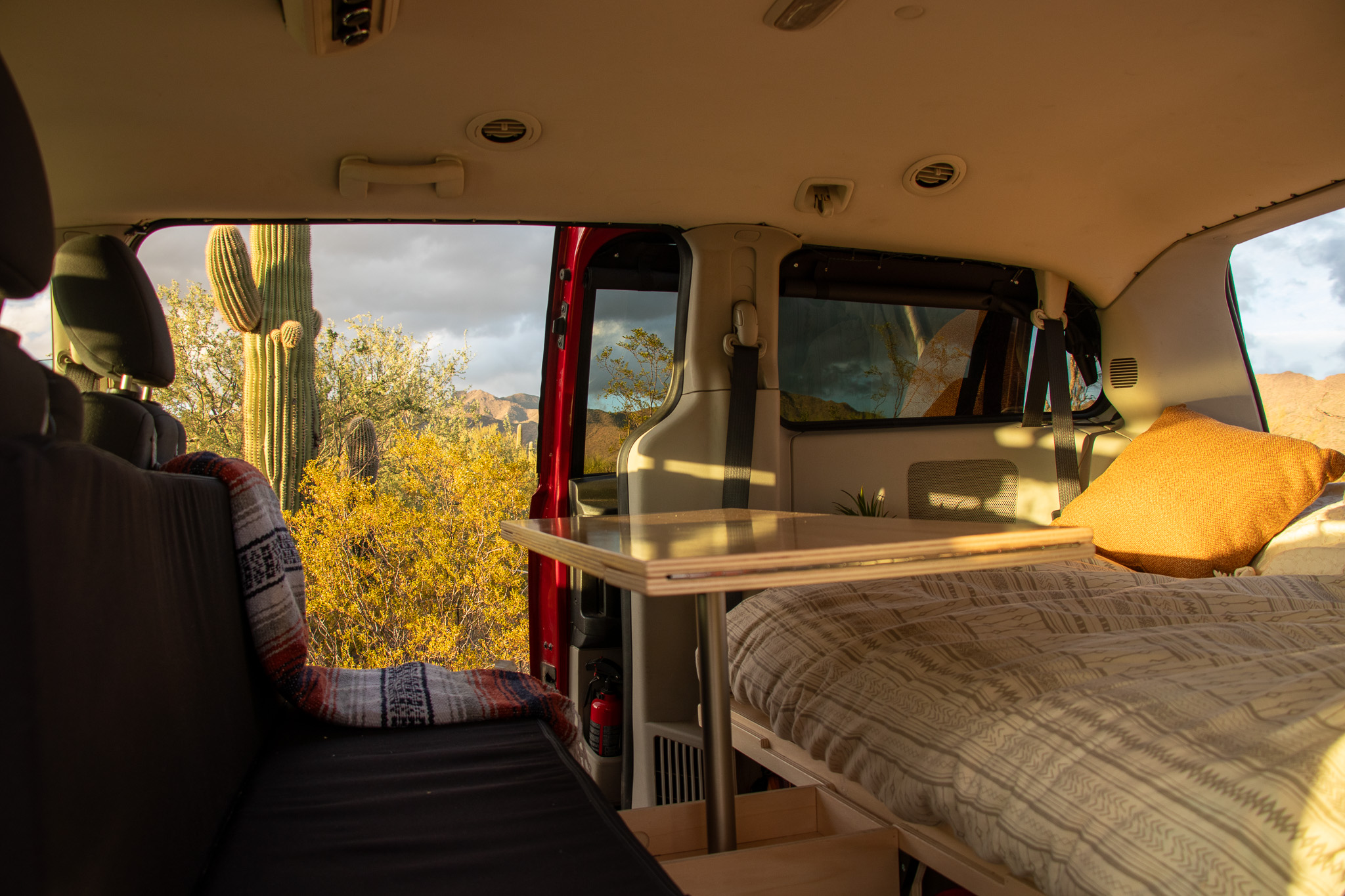 Interior of a camper van with Roadloft kit, featuring optimized design for comfort and convenience on the road.