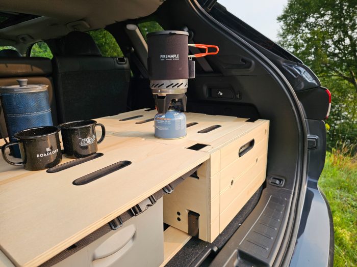 Roadloft camper kit featuring a compact FireMaple burner, perfect for outdoor cooking and camping.