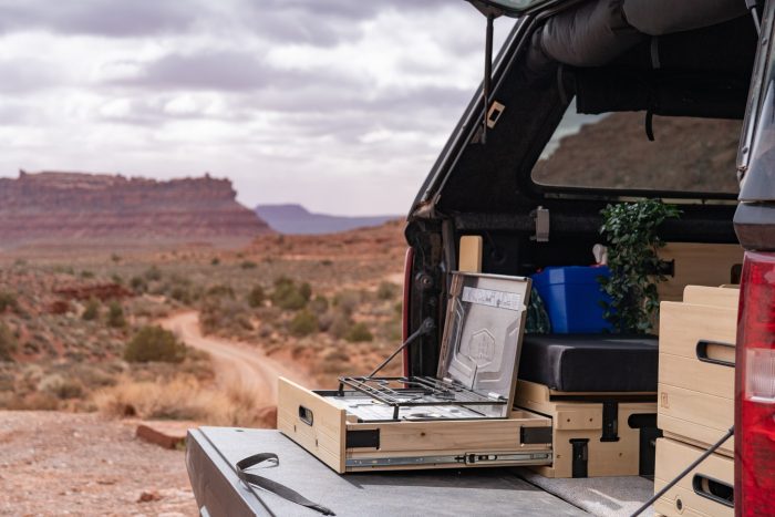 Roadloft camper kit featuring a compact Pinnacle Pro burner, perfect for outdoor cooking and camping.