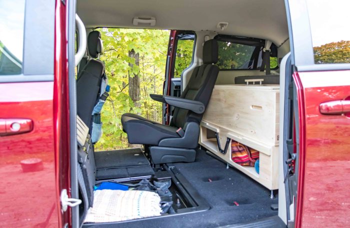 Minivan interior design with Roadloft kit, offering a functional and comfortable setup for vanlife.